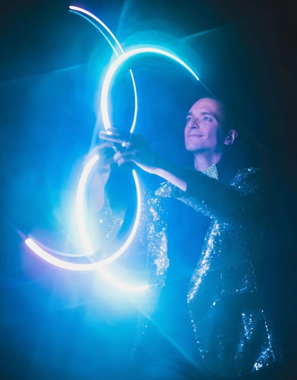 LED hoop performer spinning a glowing hoop at a luxury reception in New York City