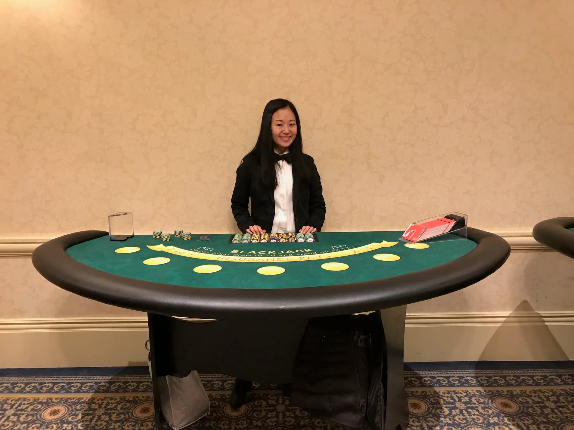 Full-size blackjack table rental with professional dealer and green felt at a Connecticut casino party
