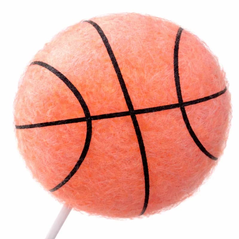 Cotton candy art hand-shaped into a basketball design for a sports-themed event