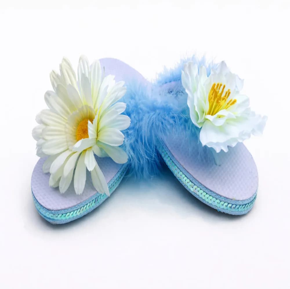 Decorate flip flops craft station with customized sandals at a party