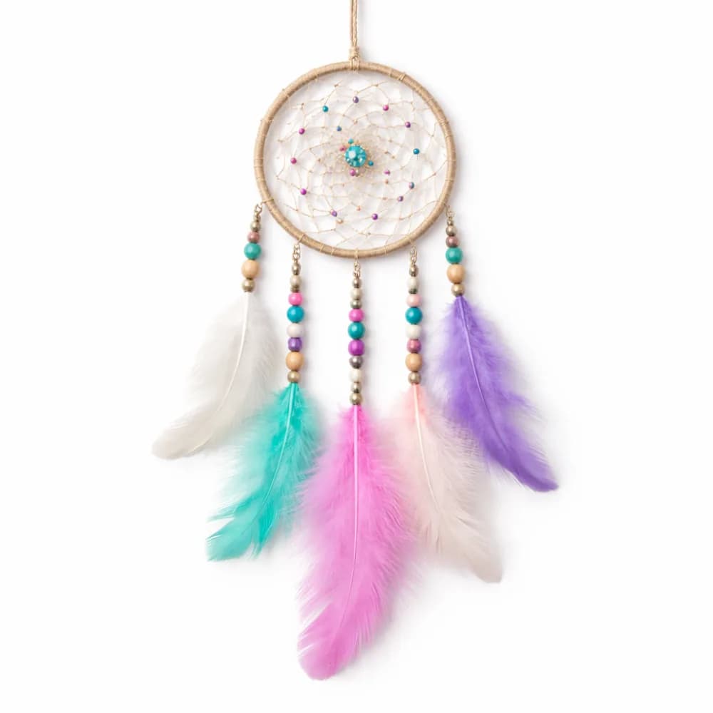 Dream catcher craft station with feathered keepsakes at a party