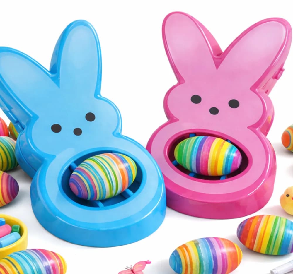 Rainbow egg decorating station with vivid dyed eggs at an event