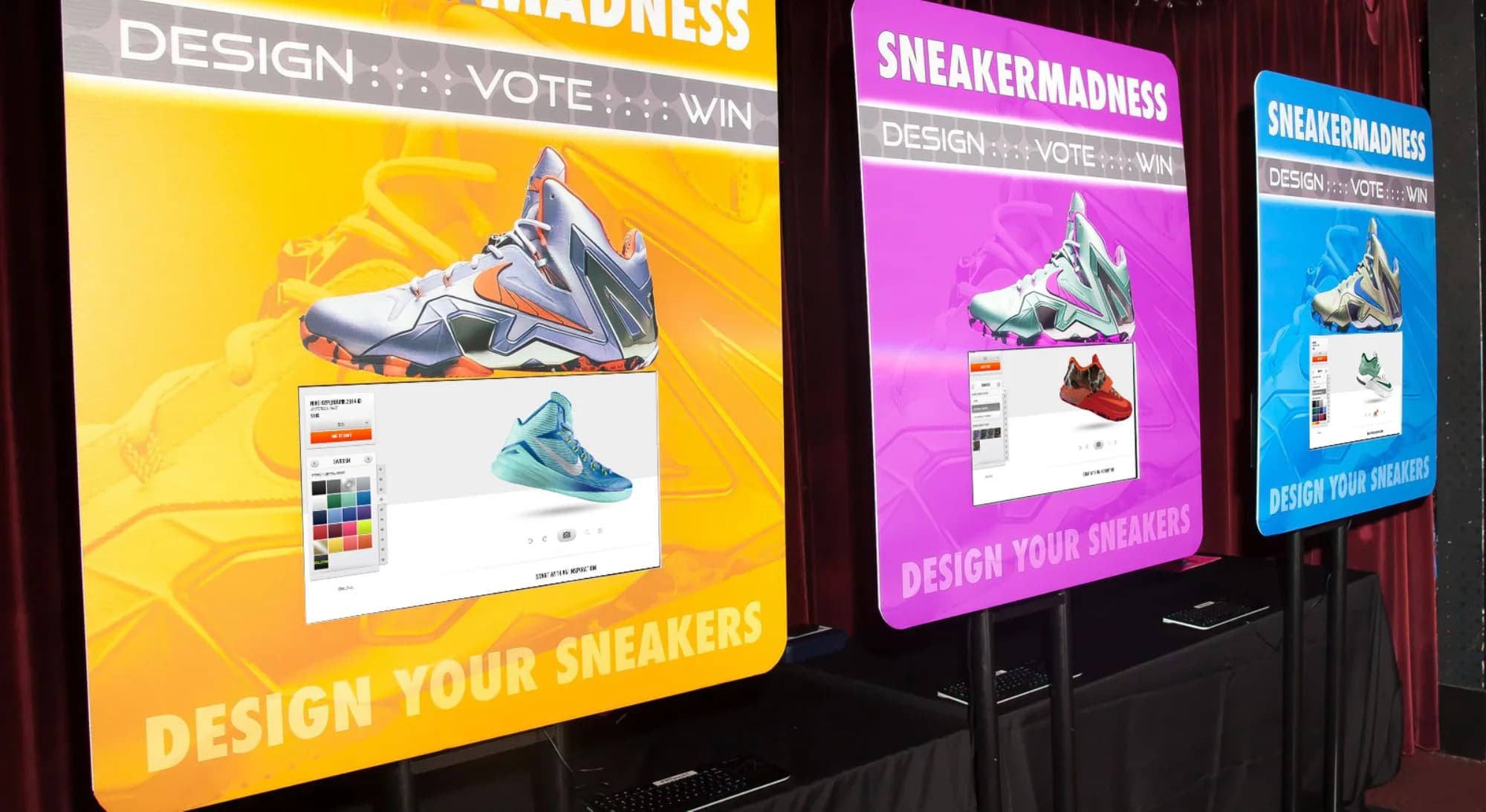 Sneaker Madness design station with illuminated display boards showing the design, vote, and win interface at a New York event