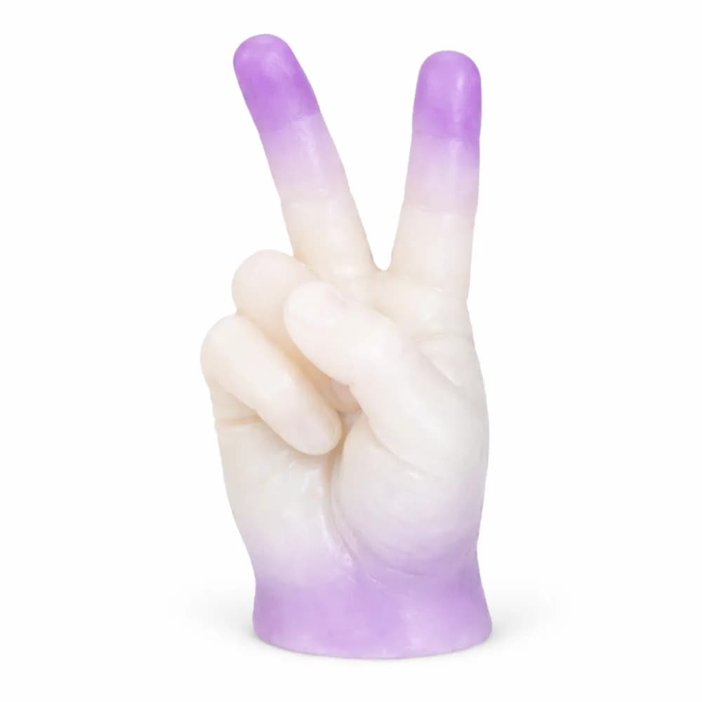 Wax hands station with colorful wax hand casts at an event