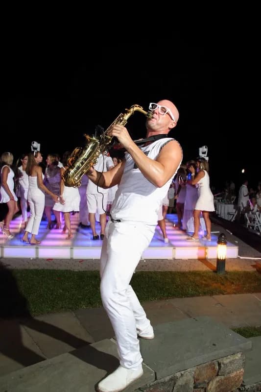 A live saxophonist performing at a Nicholson Events celebration