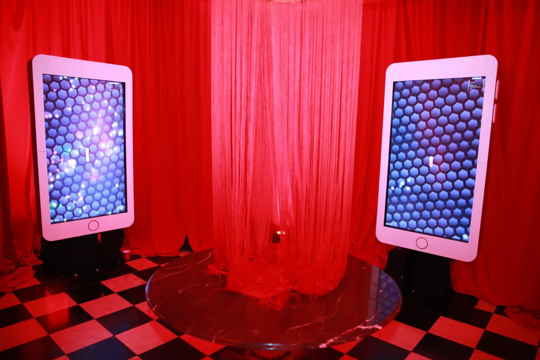 Guests playing on the giant touchscreen phone game at a bar mitzvah in New York, fun interactive party activity