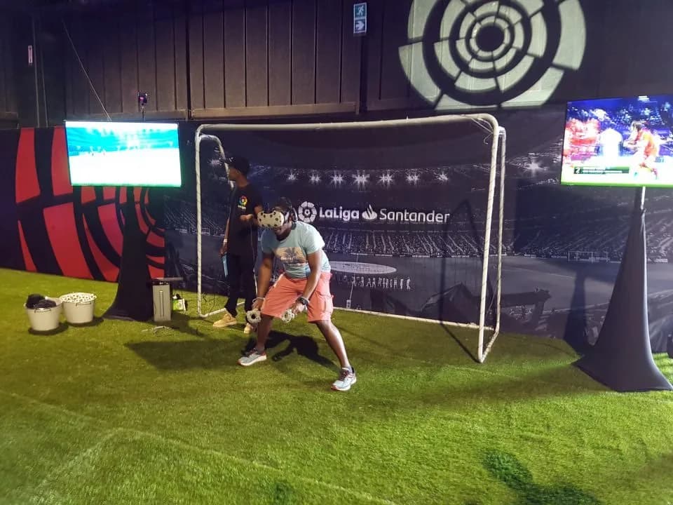 VR game arena booth setup at a mitzvah party or gala, showing the full branded immersive virtual reality station