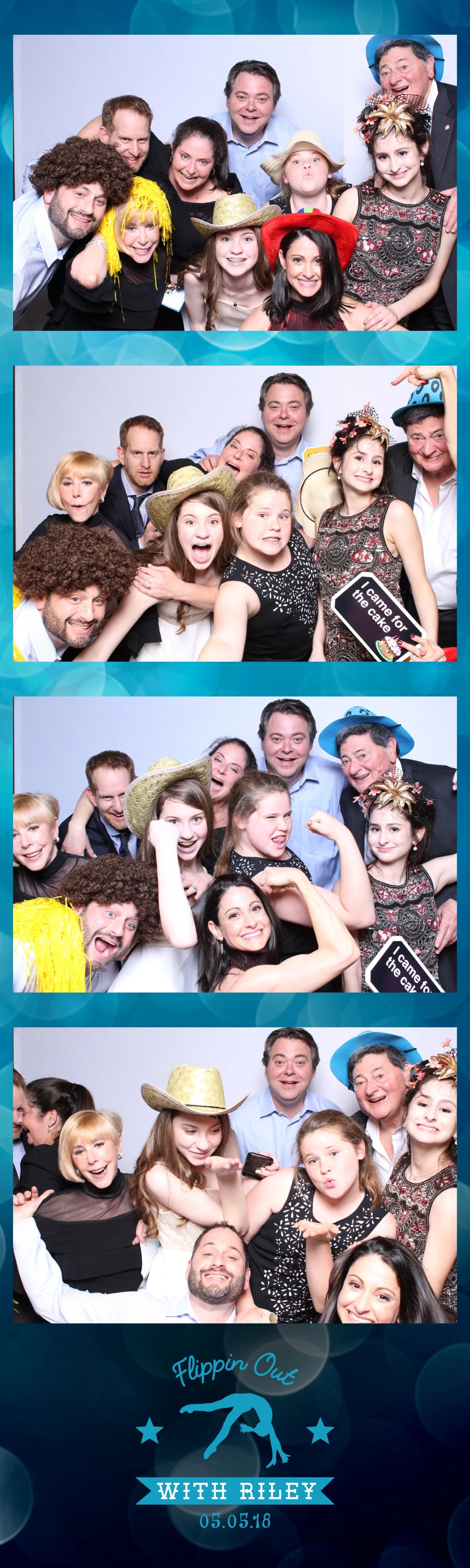 Oversized mega-strip photo print showing a large group of guests in costume at an event celebration
