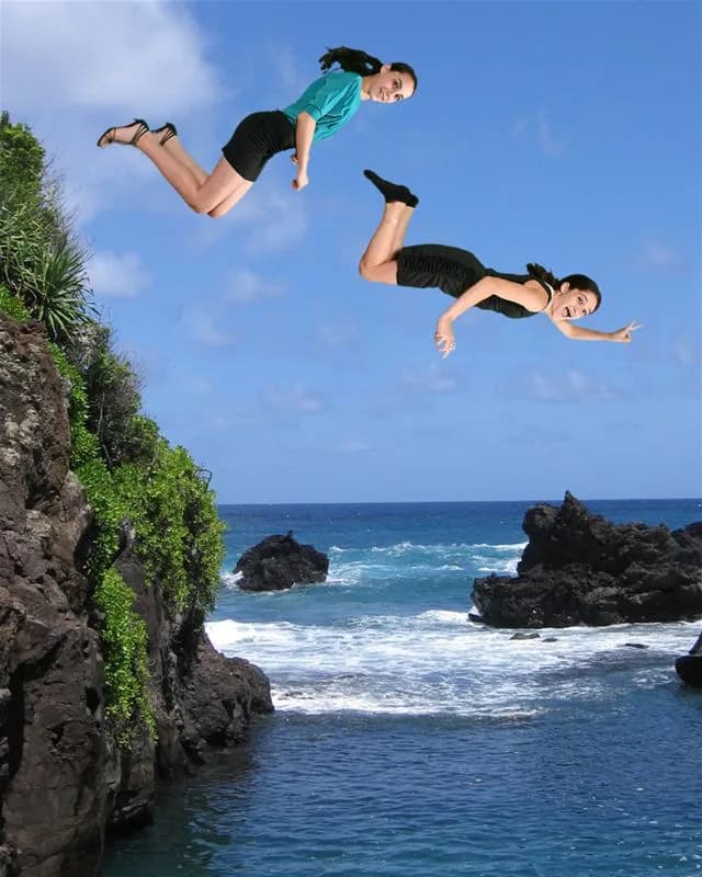 Two guests composited mid-air diving off a rocky ocean cliff in a jump shot photo experience